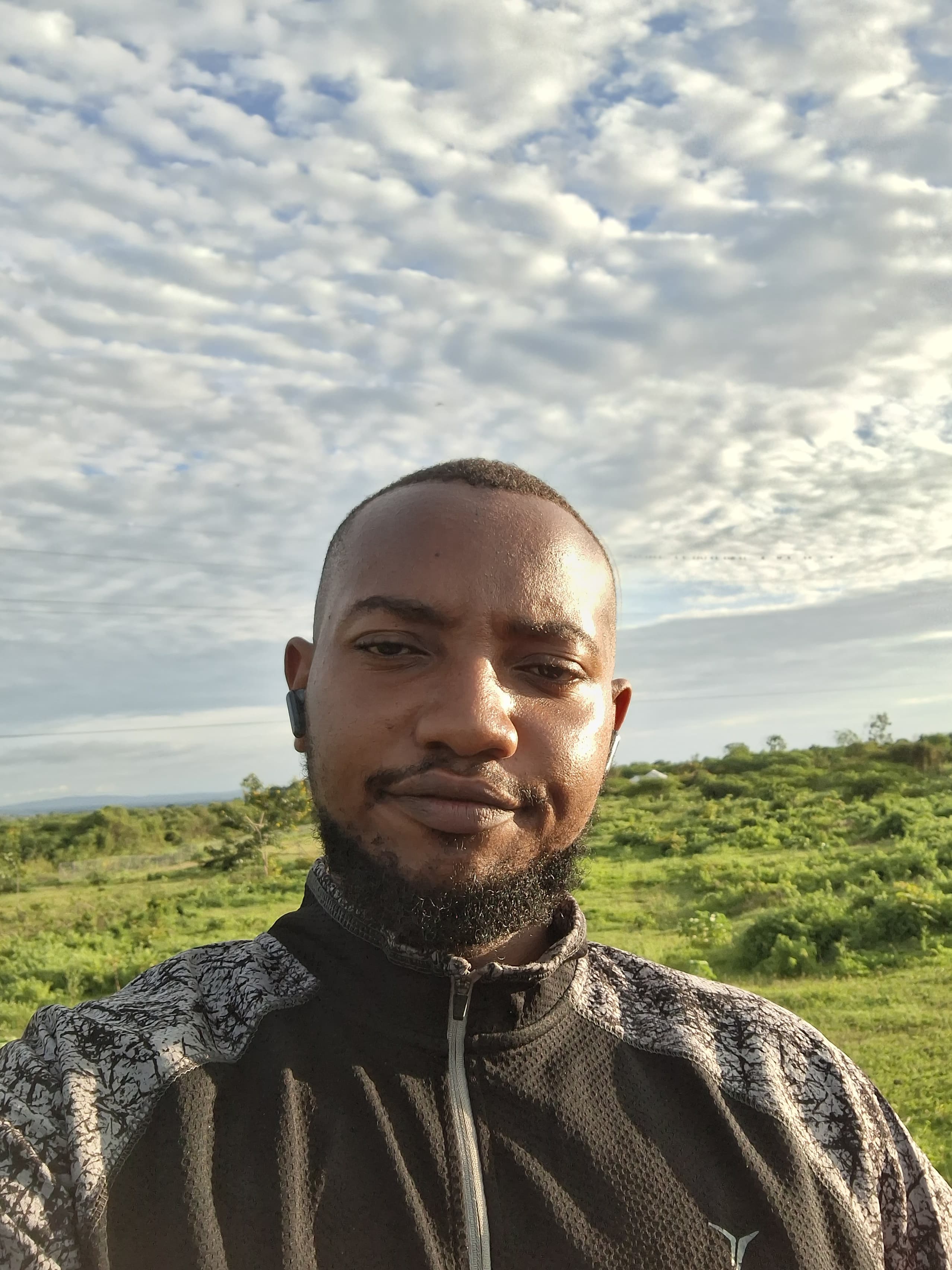 Michael Ager Midenga Headshot